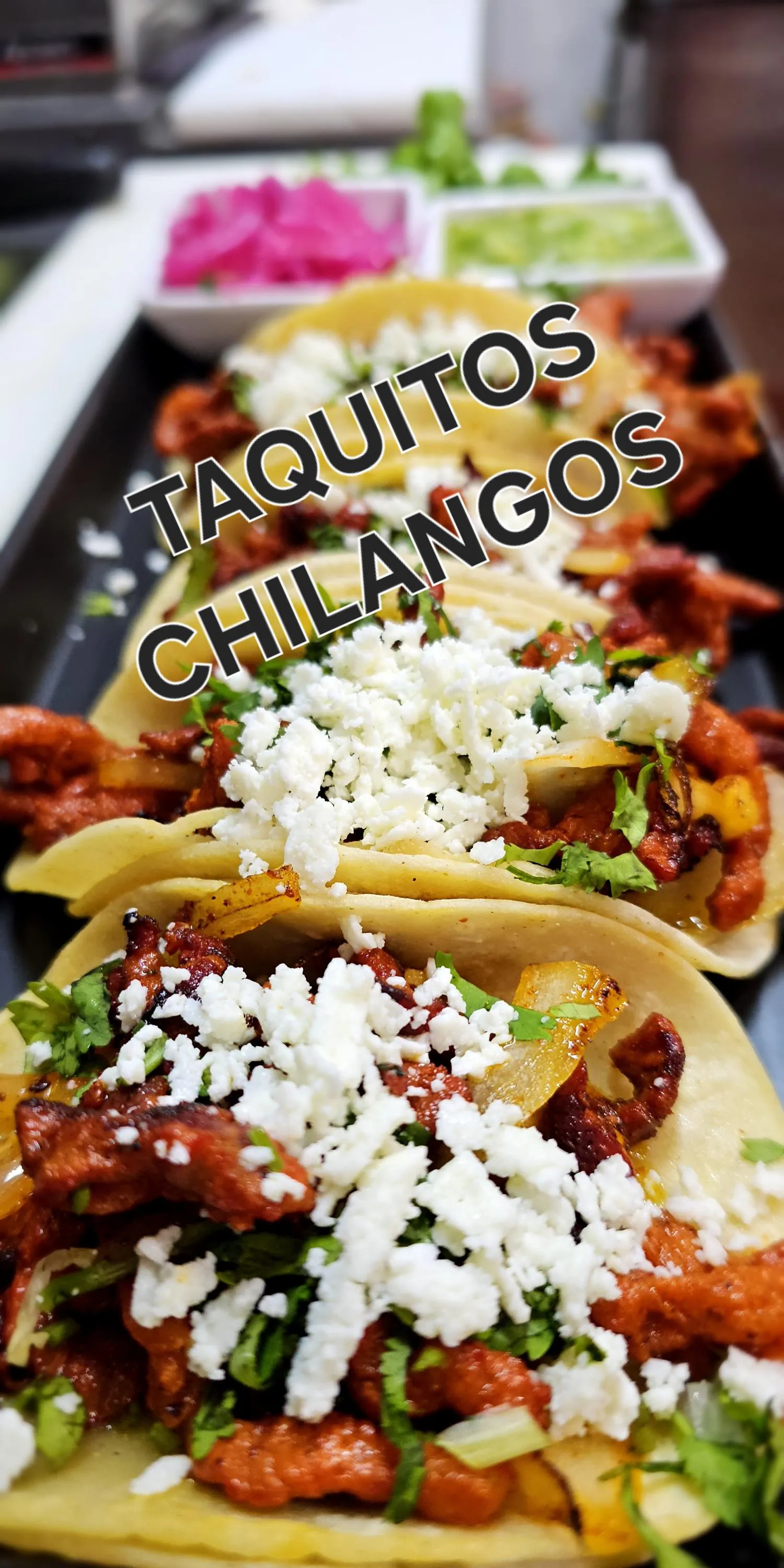 Taquitos Chilangos at El Rincon de Chavita, Mexican-style Restaurant in Houston